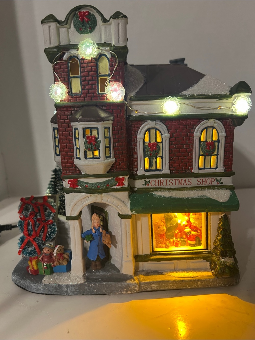 St. Nicholas Square Red and Green Lighted Christmas Shop Village Building